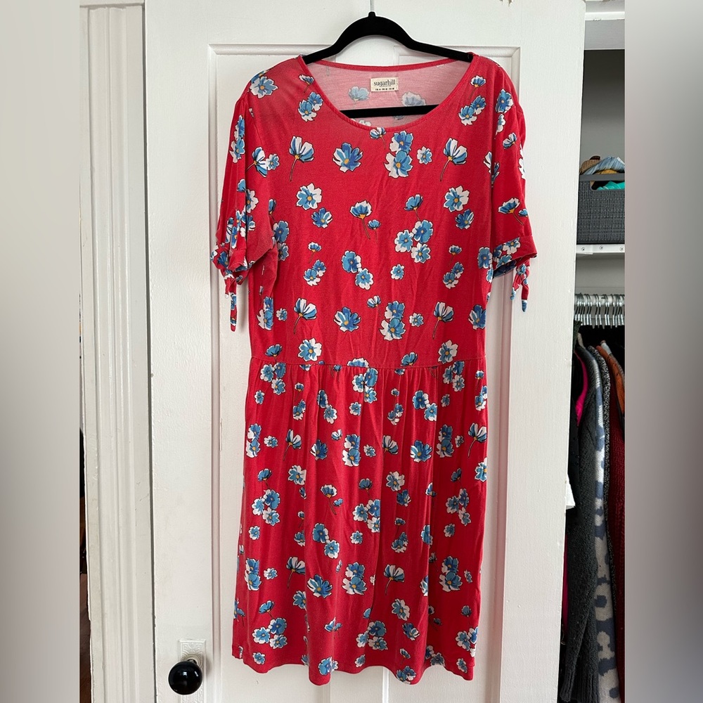 Red knit dress with blue flowers